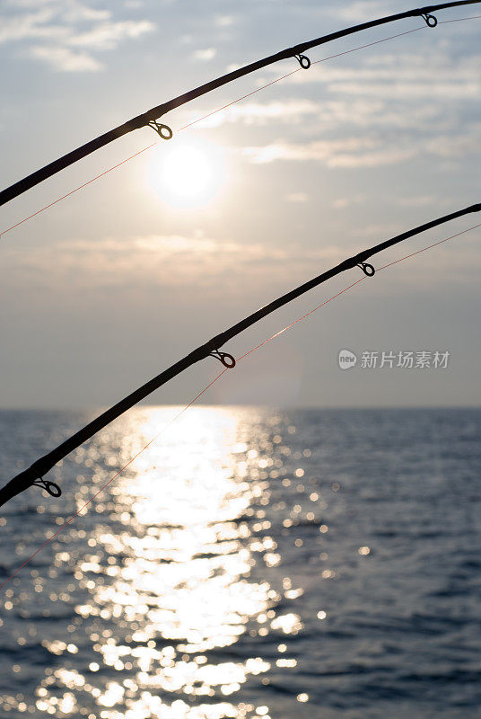 鱼竿和水平线日落/日出